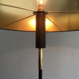Designer floor lamp in black lacquered metal and brass
