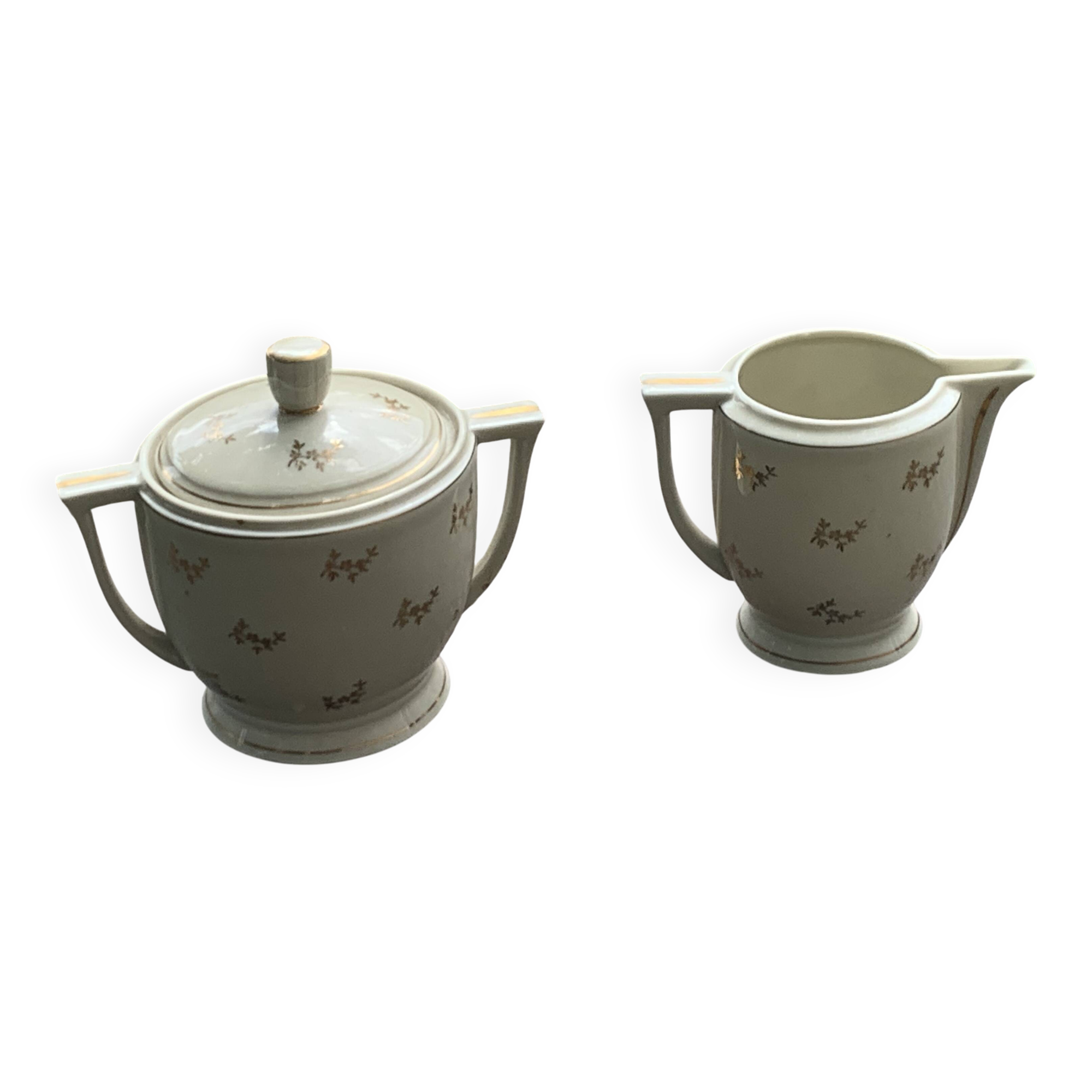 Antique porcelain sugar bowl and milk jug from the Royal Factory of Limoges, France