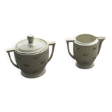 Antique porcelain sugar bowl and milk jug from the Royal Factory of Limoges, France