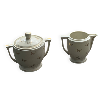 Antique porcelain sugar bowl and milk jug from the Royal Factory of Limoges, France