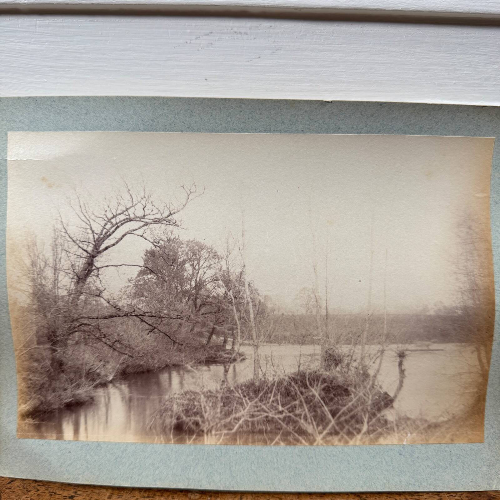 Photo album glued onto cardboard depicting a 19th-century watercourse.