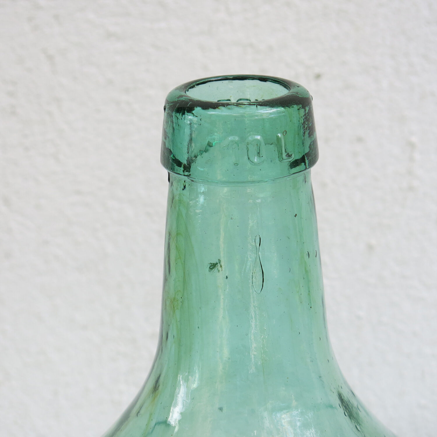 Vintage glass demijohn