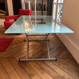 Table that can be transformed into a coffee table with 2 height settings