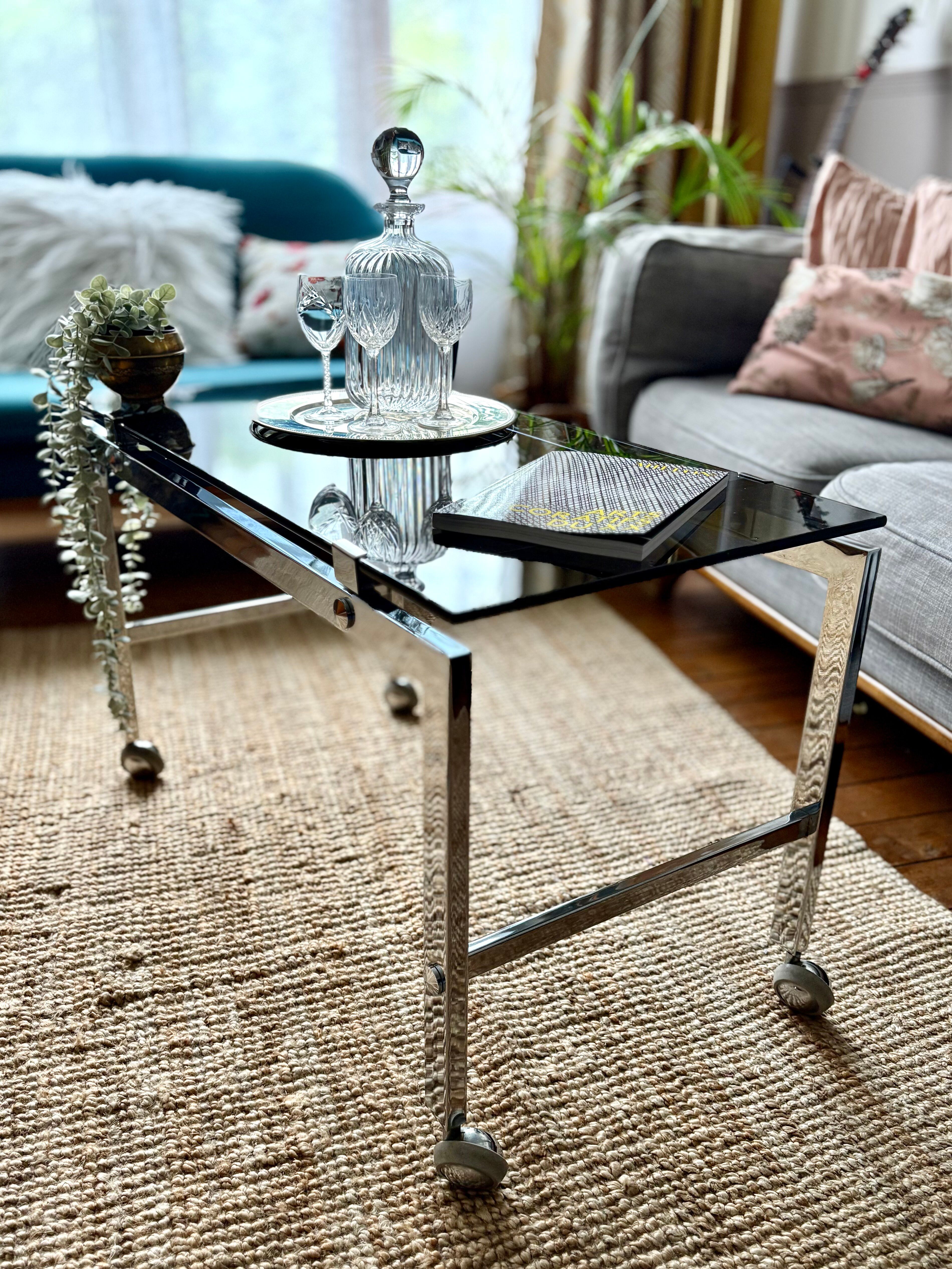 Chrome and smoked glass coffee table on wheels 1970