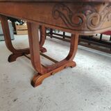 Art Deco extendable table in solid wood and brass.