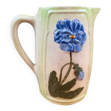 Vintage blue floral ceramic pitcher.