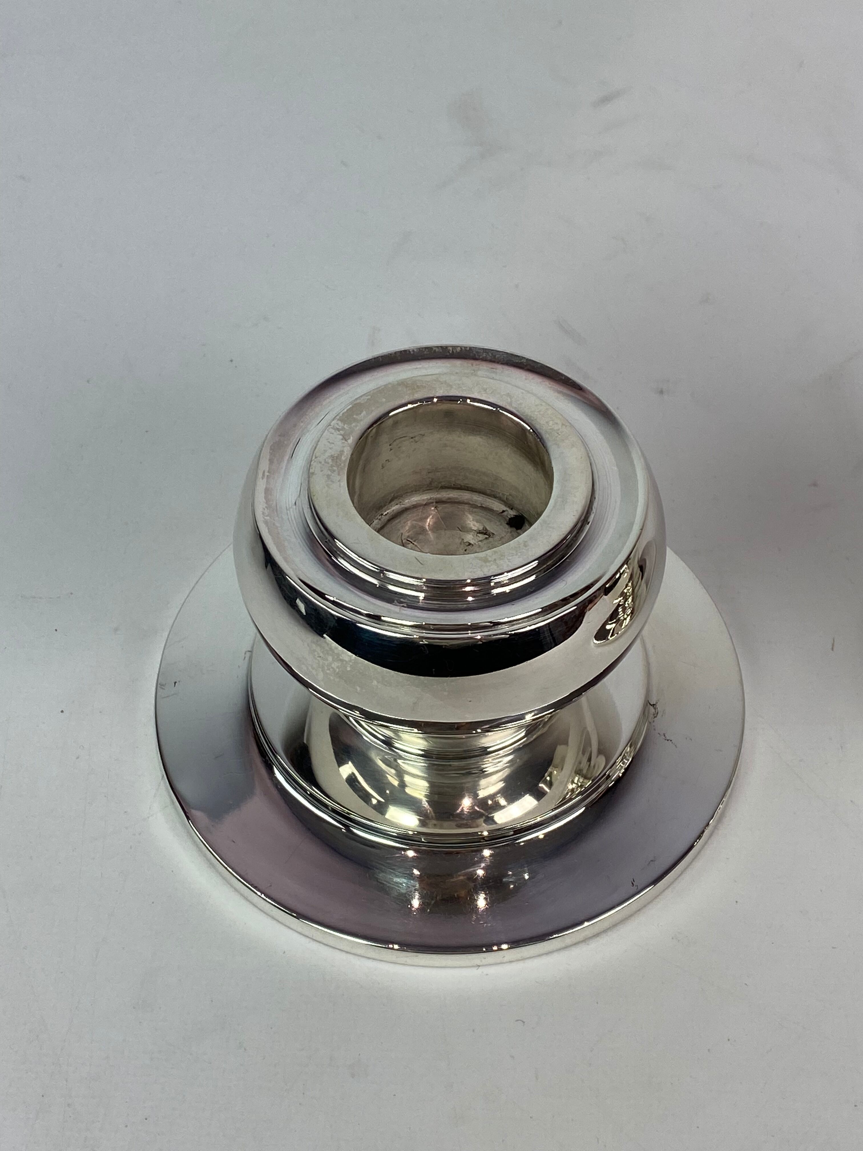 Set of two low candlesticks of 925 sterling and hallmarked silver, 1930s