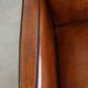 Cognac-colored sheepskin Art Deco design armchair in good condition