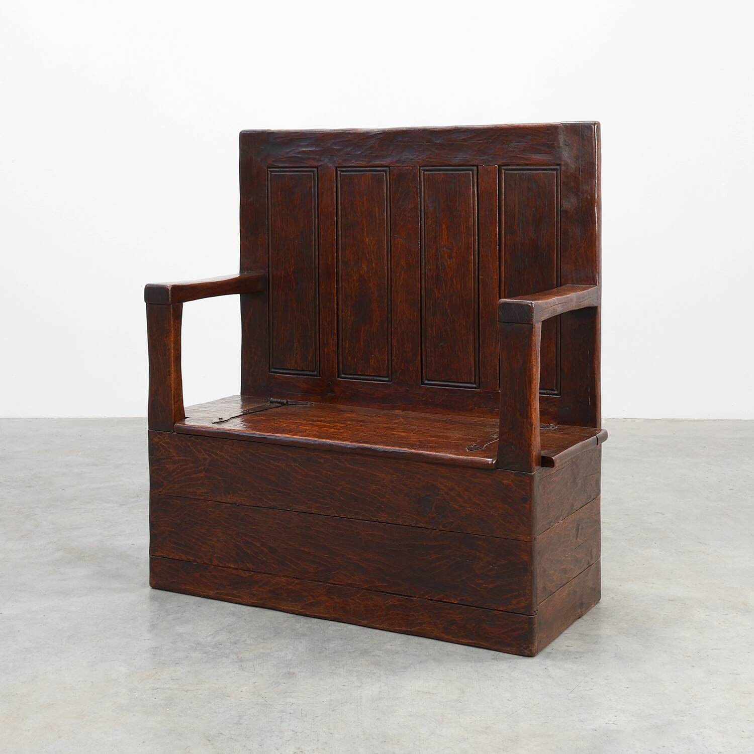 Rustic solid oak carved bench with storage compartment, France 19th century