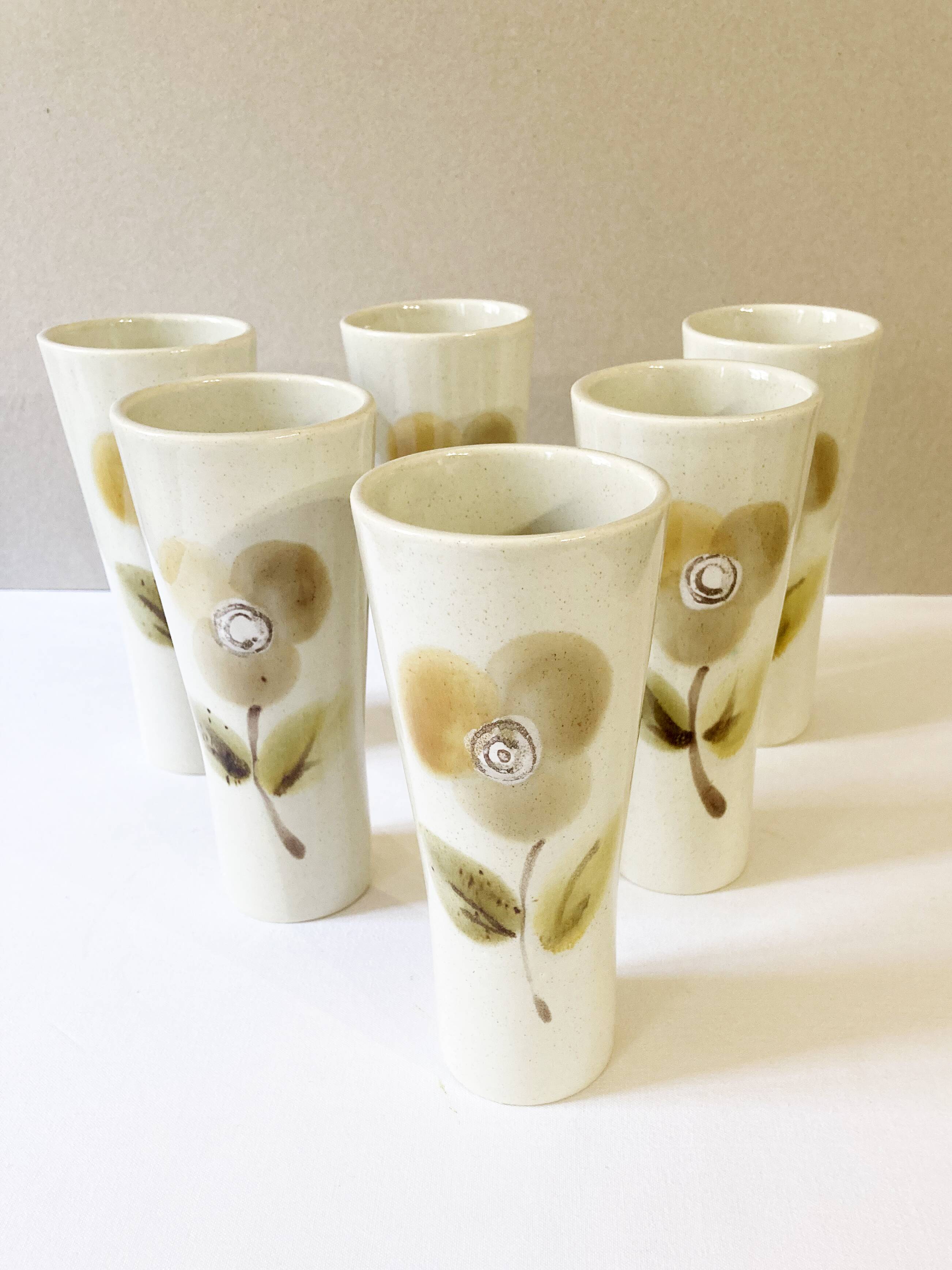 Large ceramic glasses, hand-painted flower pattern, beige/cream tones
