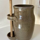Old varnished stoneware pickle pot with tongs
