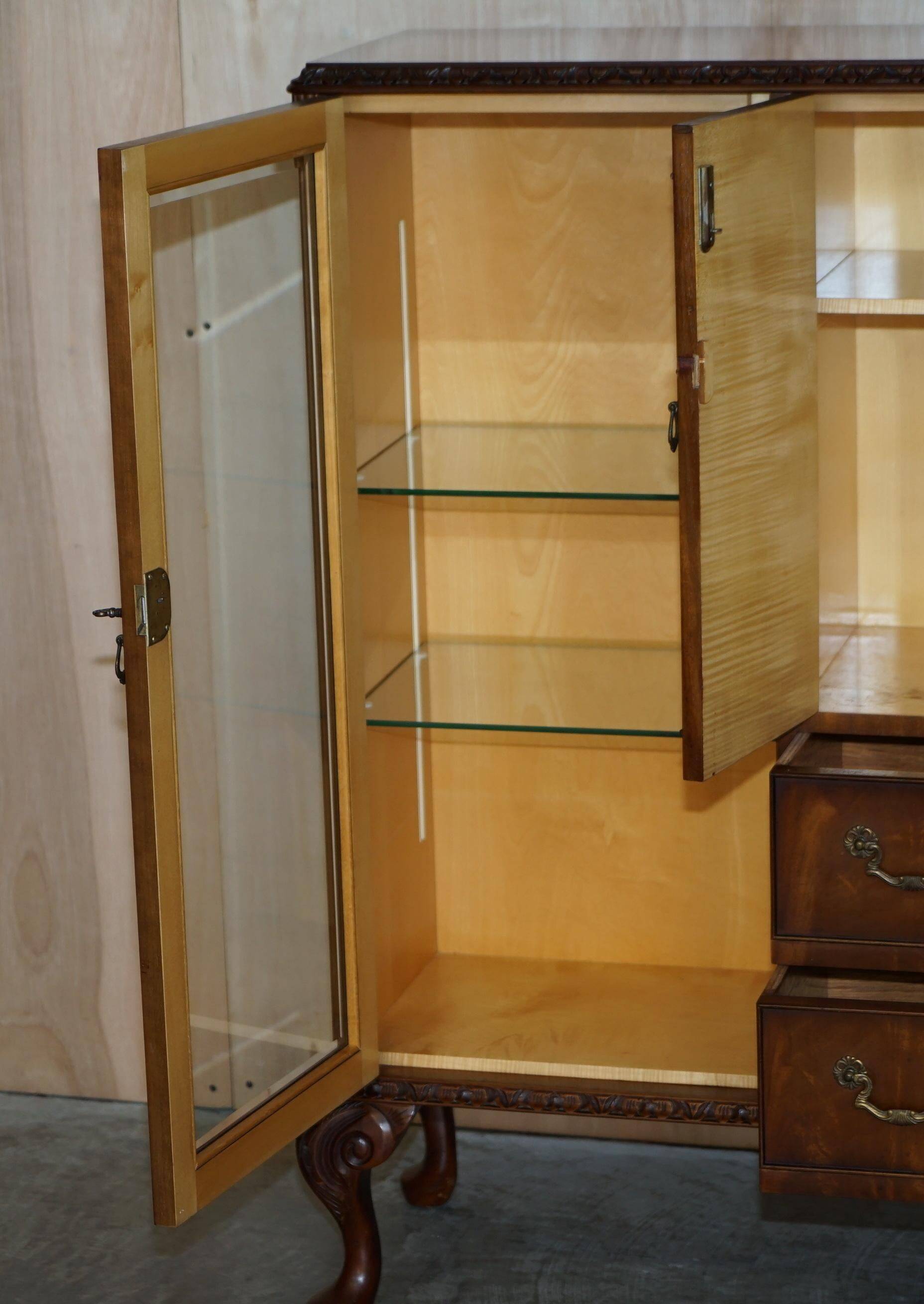 Vintage buffet display cabinet circa 1940 in flame mahogany and satinwood.