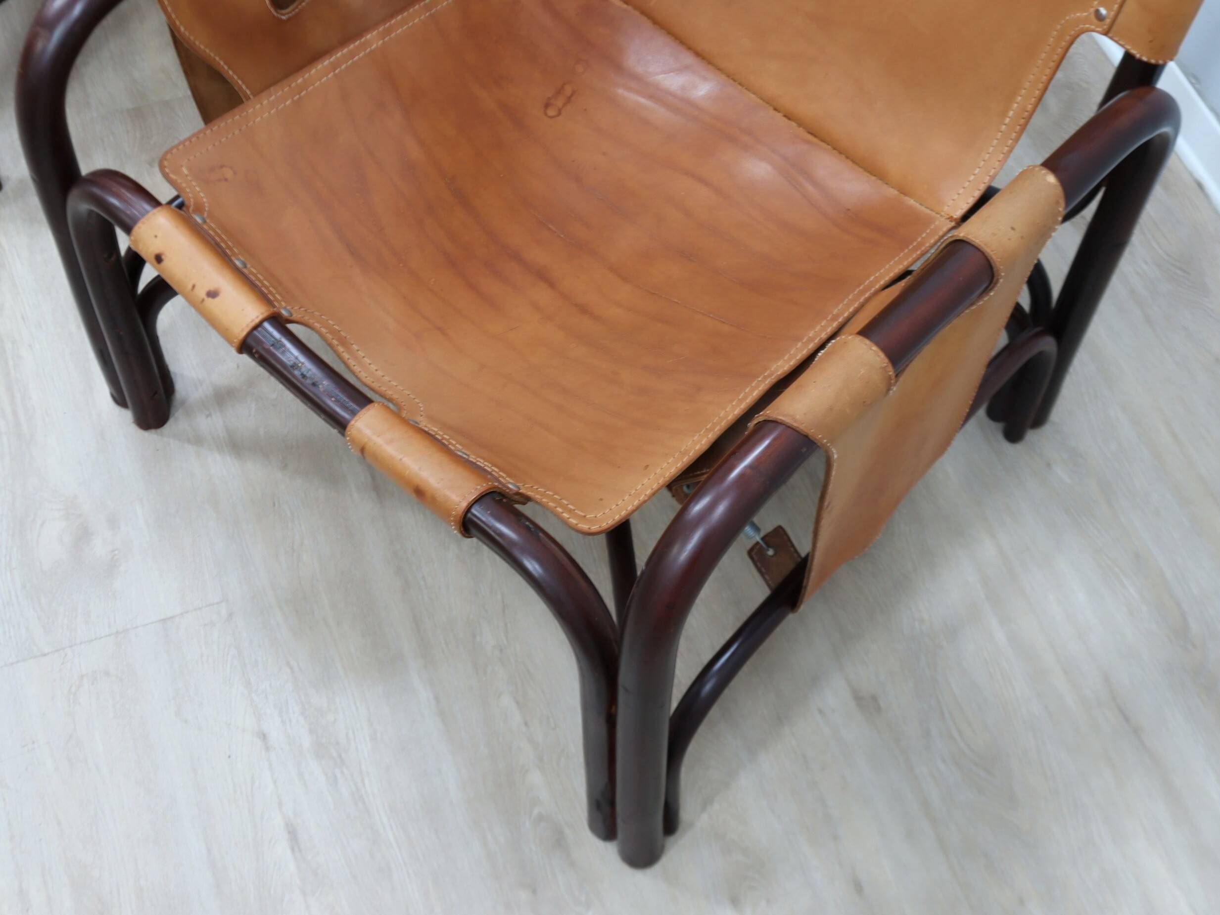 A vintage Tito Agnoli armchair leather and bamboo 1960s