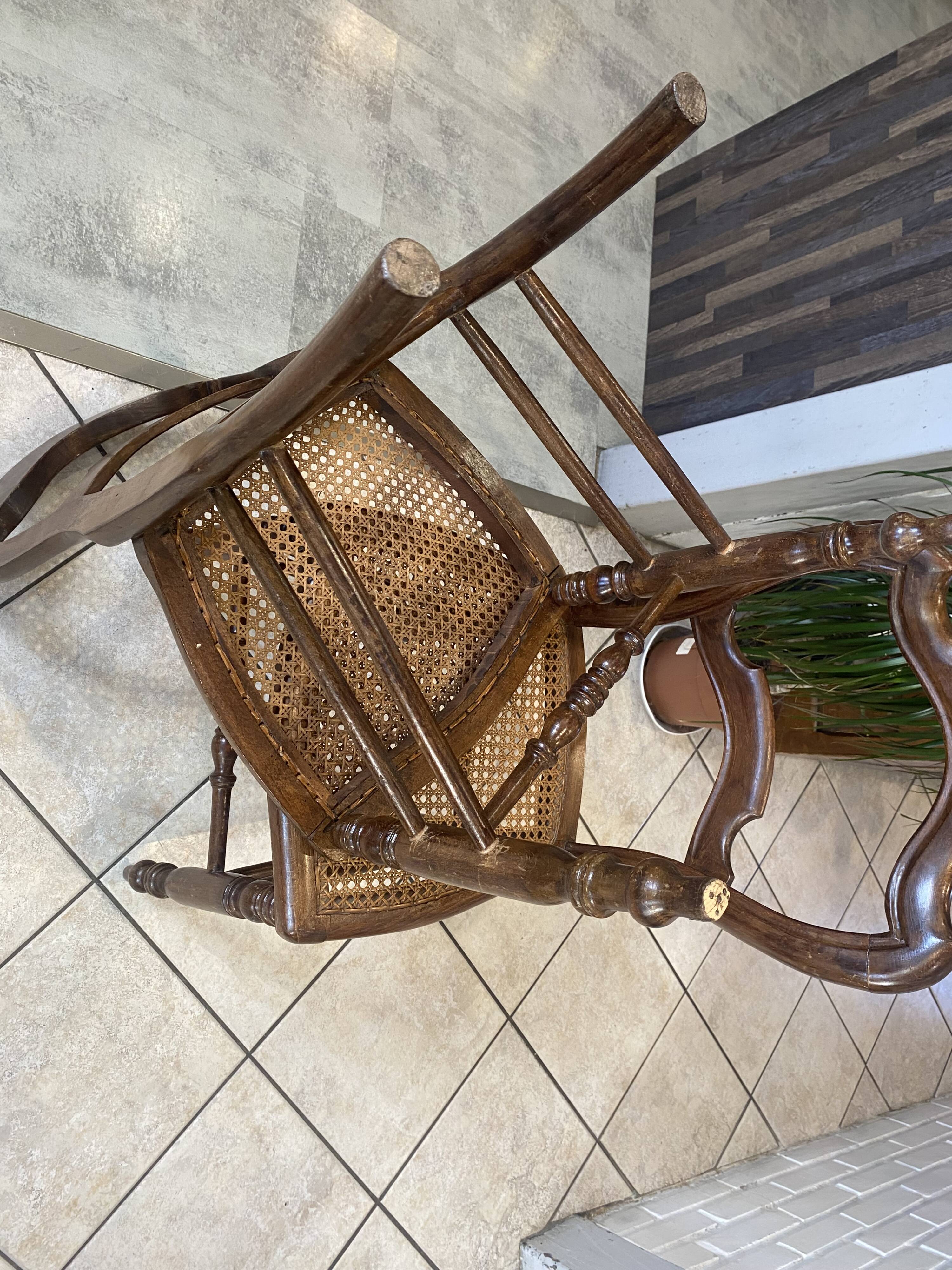 Pair of N2 antique caned and wooden chairs from the 1900s.