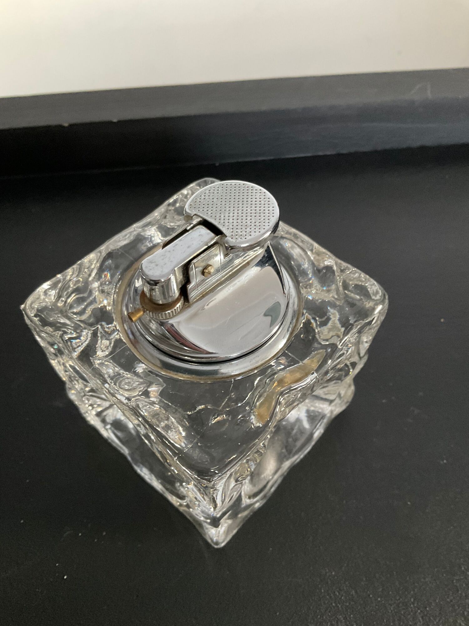 Vintage lighter from the 70s in molded glass