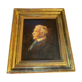 Old portrait in gilded wood