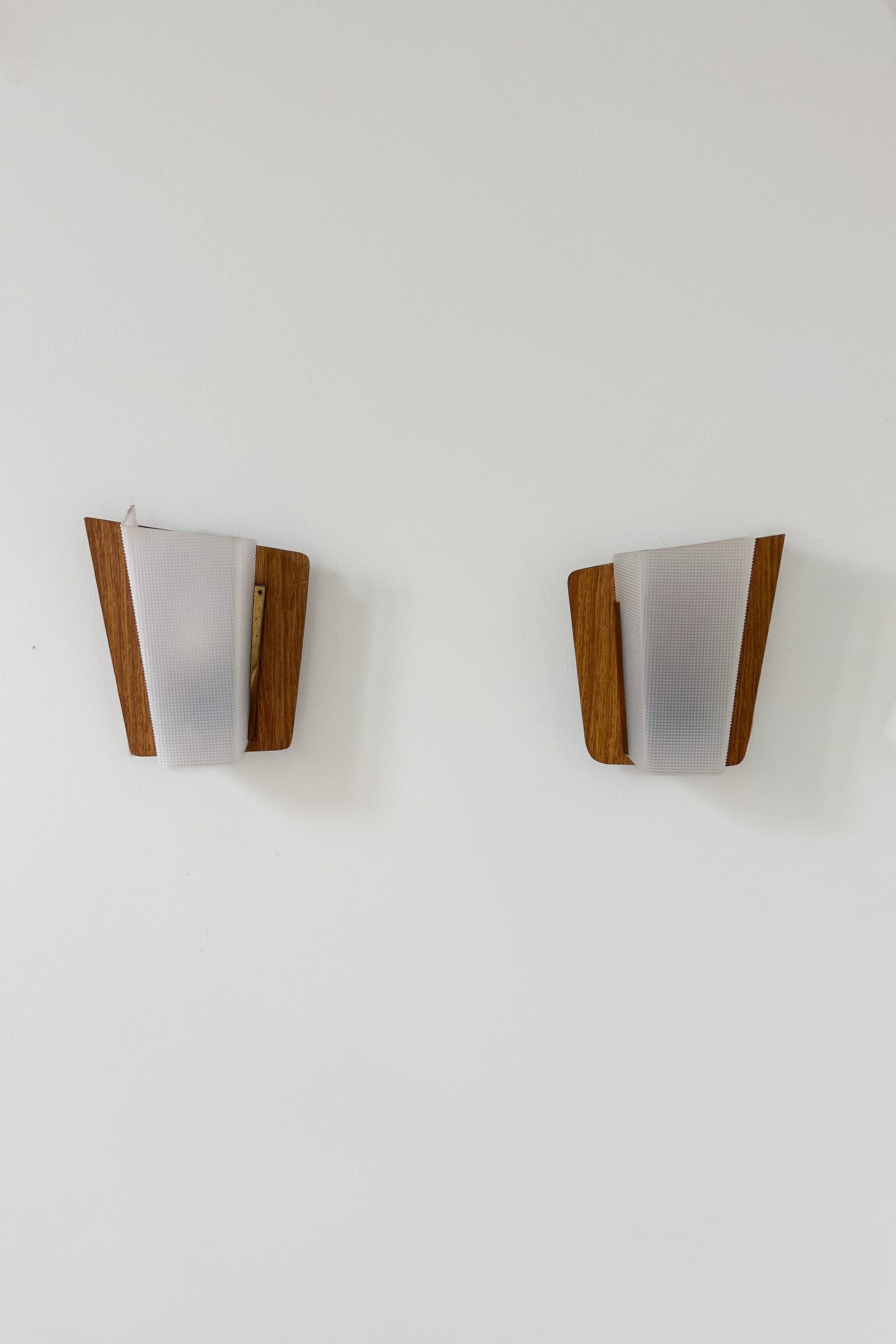Pair of vintage perspex and wood wall lights, France 1960.