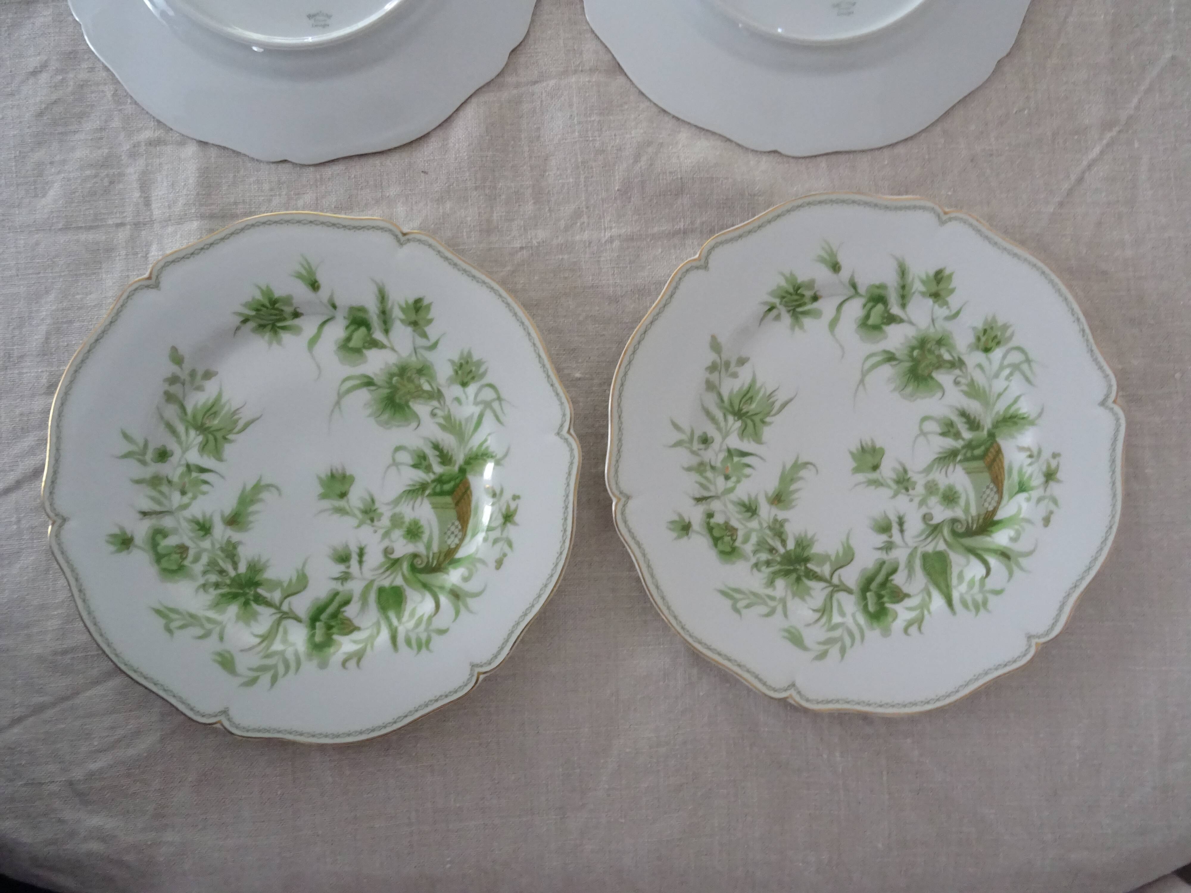 6 flat plates and 1 round dish haviland limoges with green and gold horn