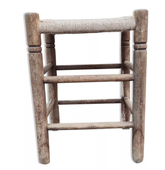 Vintage handmade wooden stool and rope