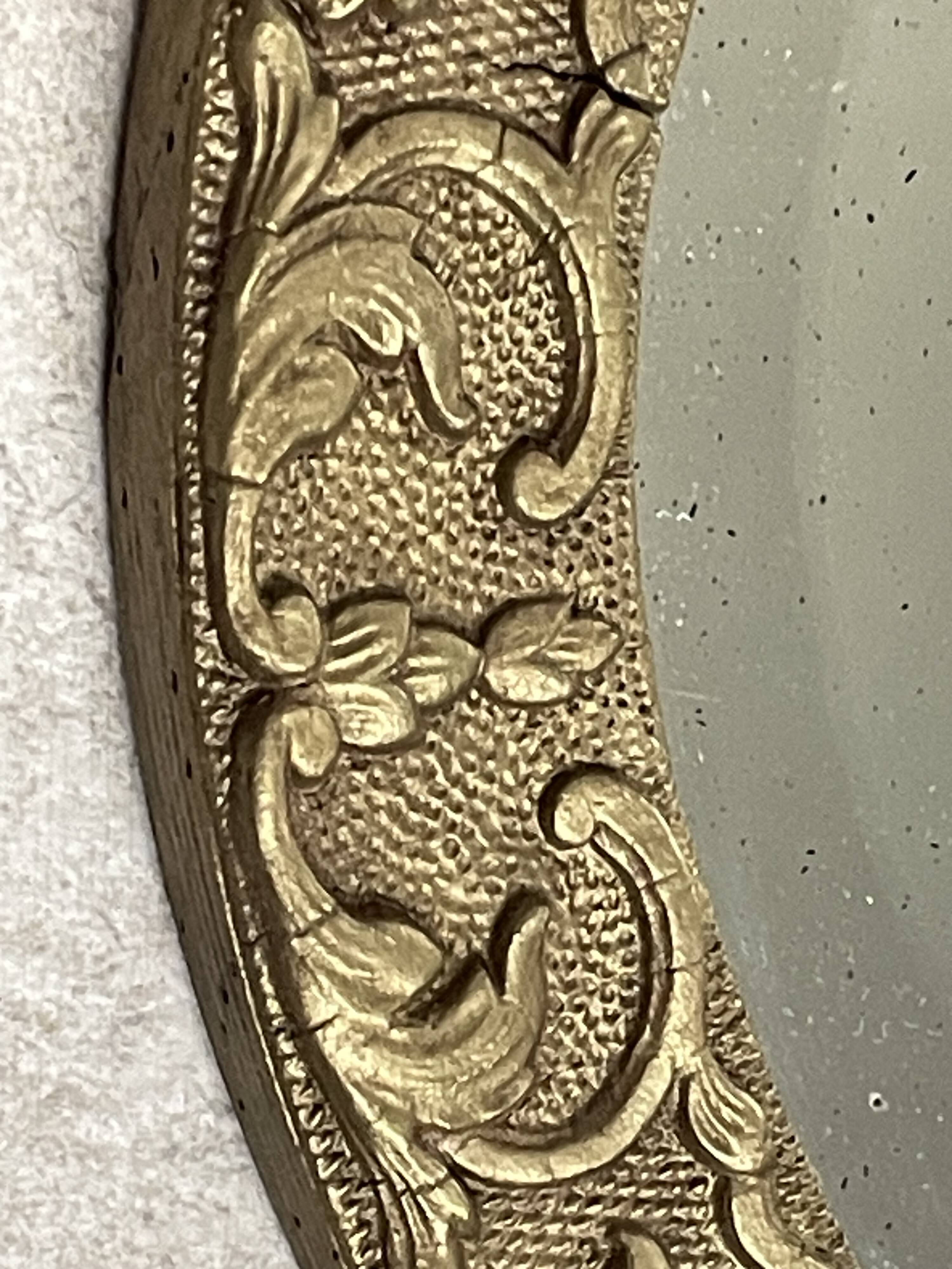 19th century beveled oval mirror