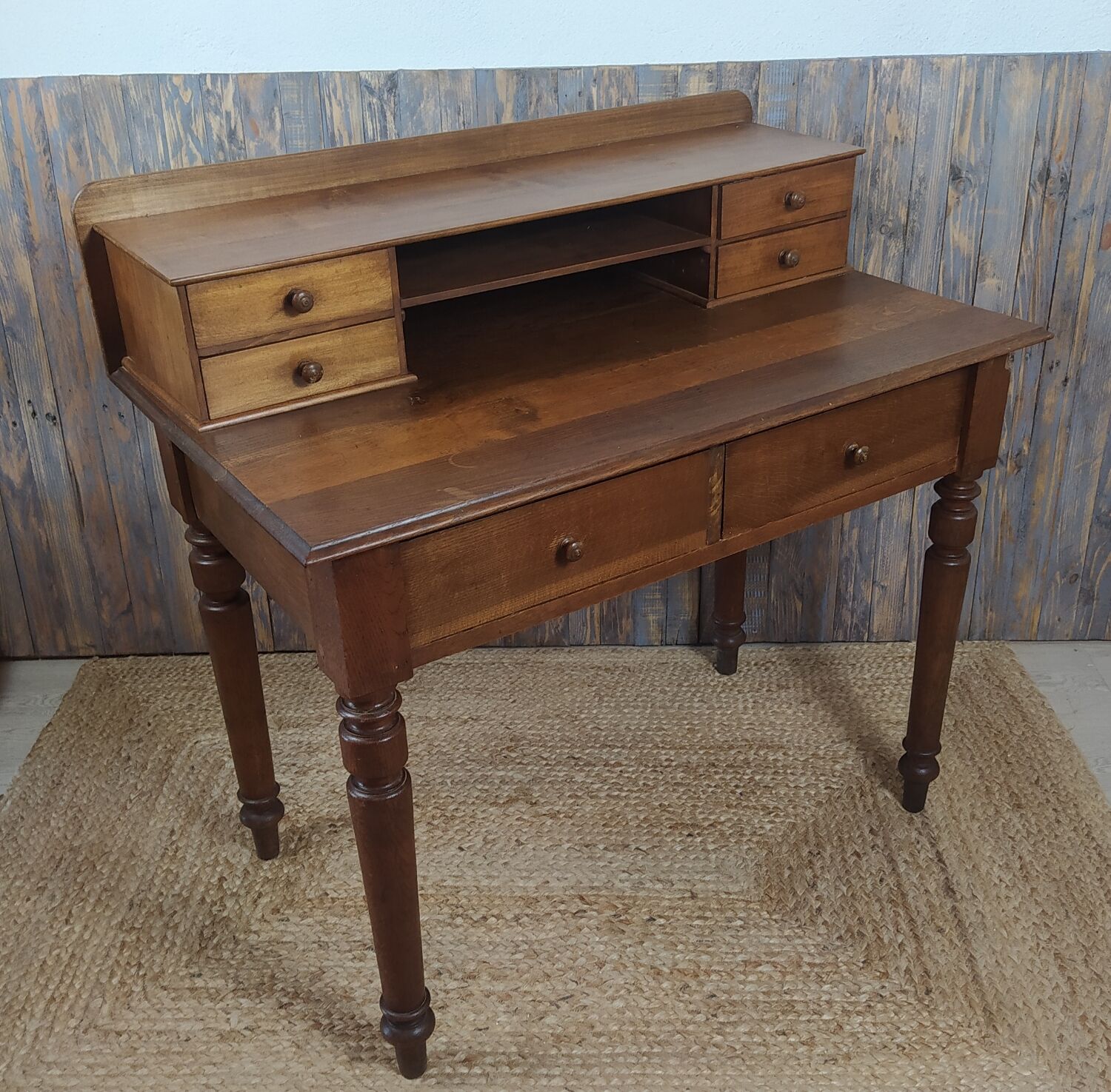 Wooden desk with turned feet