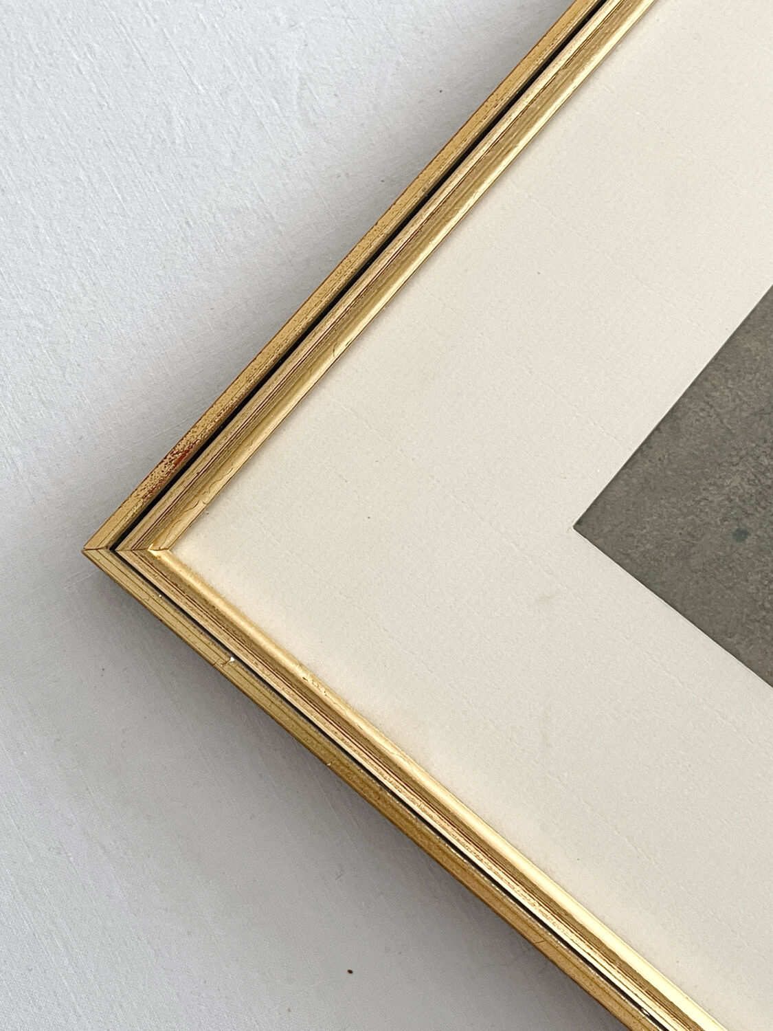 Old watercolour and gilded frame with cherry blossoms.