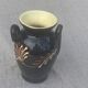 Vintage hand-painted yellow and black glazed ceramic amphora vase
