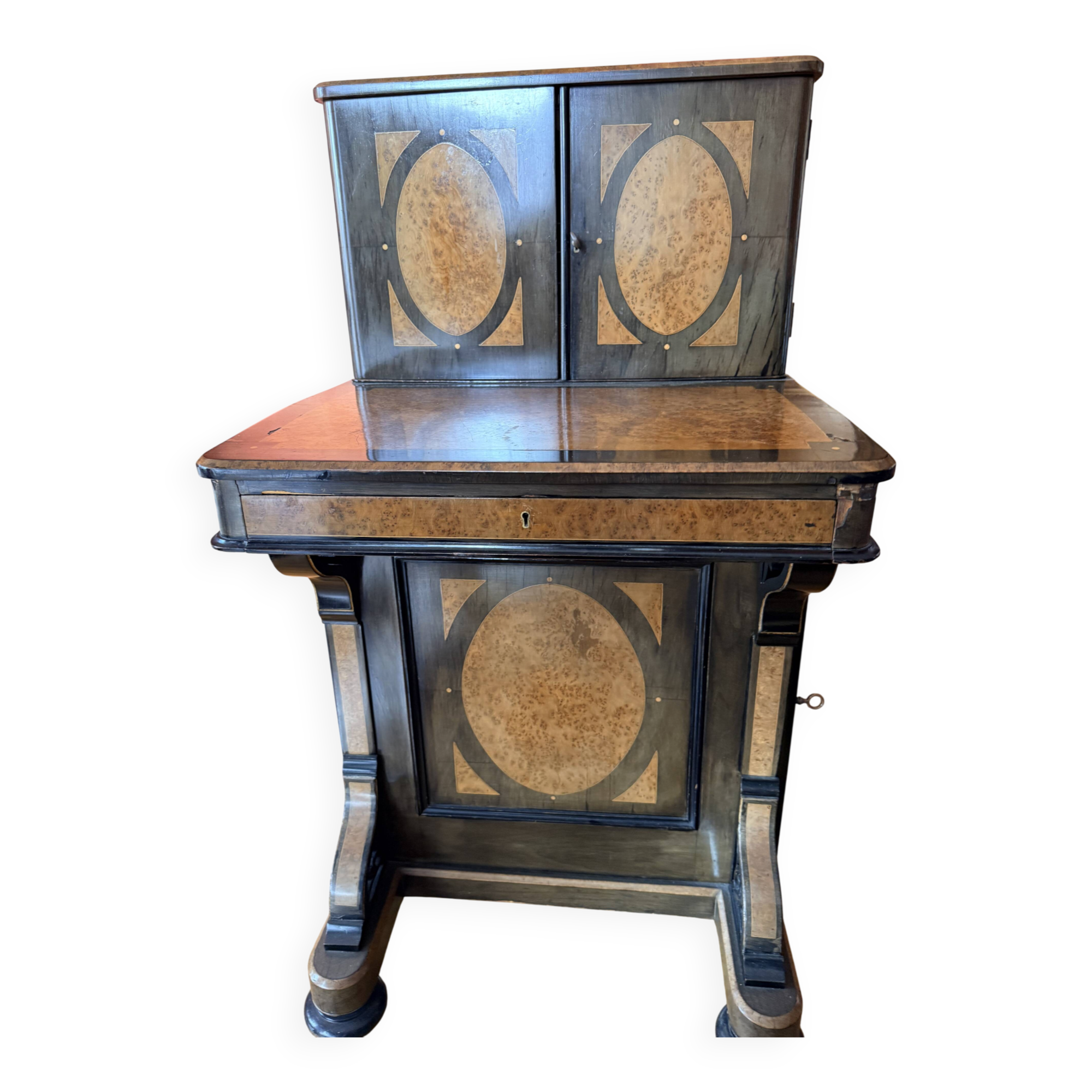 Victorian-era blackened wood and burr walnut Davenport.
