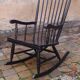 Rocking-chair vintage 50s in black lacquered wood