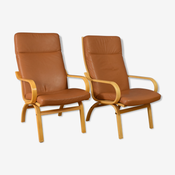 Pair of mid century retro vintage danish tan leather lounge armchair  1970s