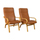 Paire de fauteuils de milieu de siècle en cuir et base en hêtre, design danois