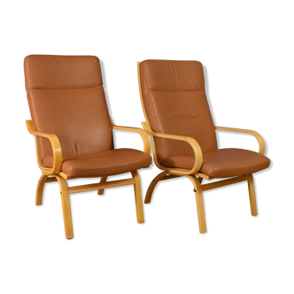 Pair of mid century retro vintage danish tan leather lounge armchair  1970s