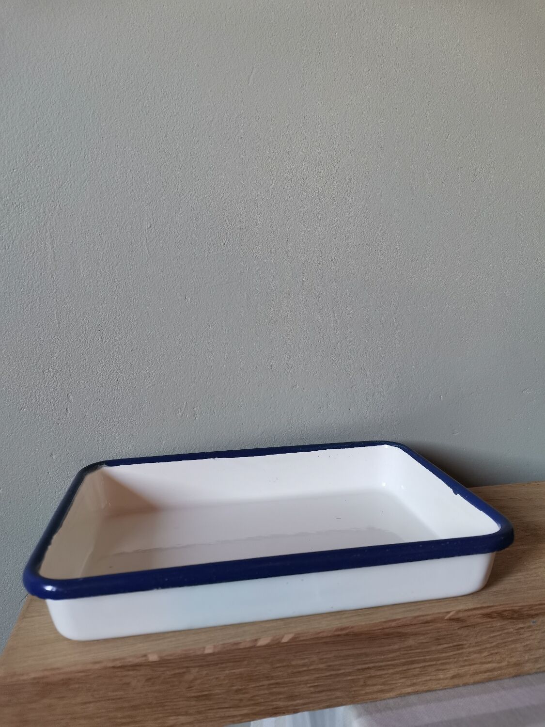 Blue and white vintage enamelled metal dish