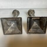 Pair of ornate silver candlesticks