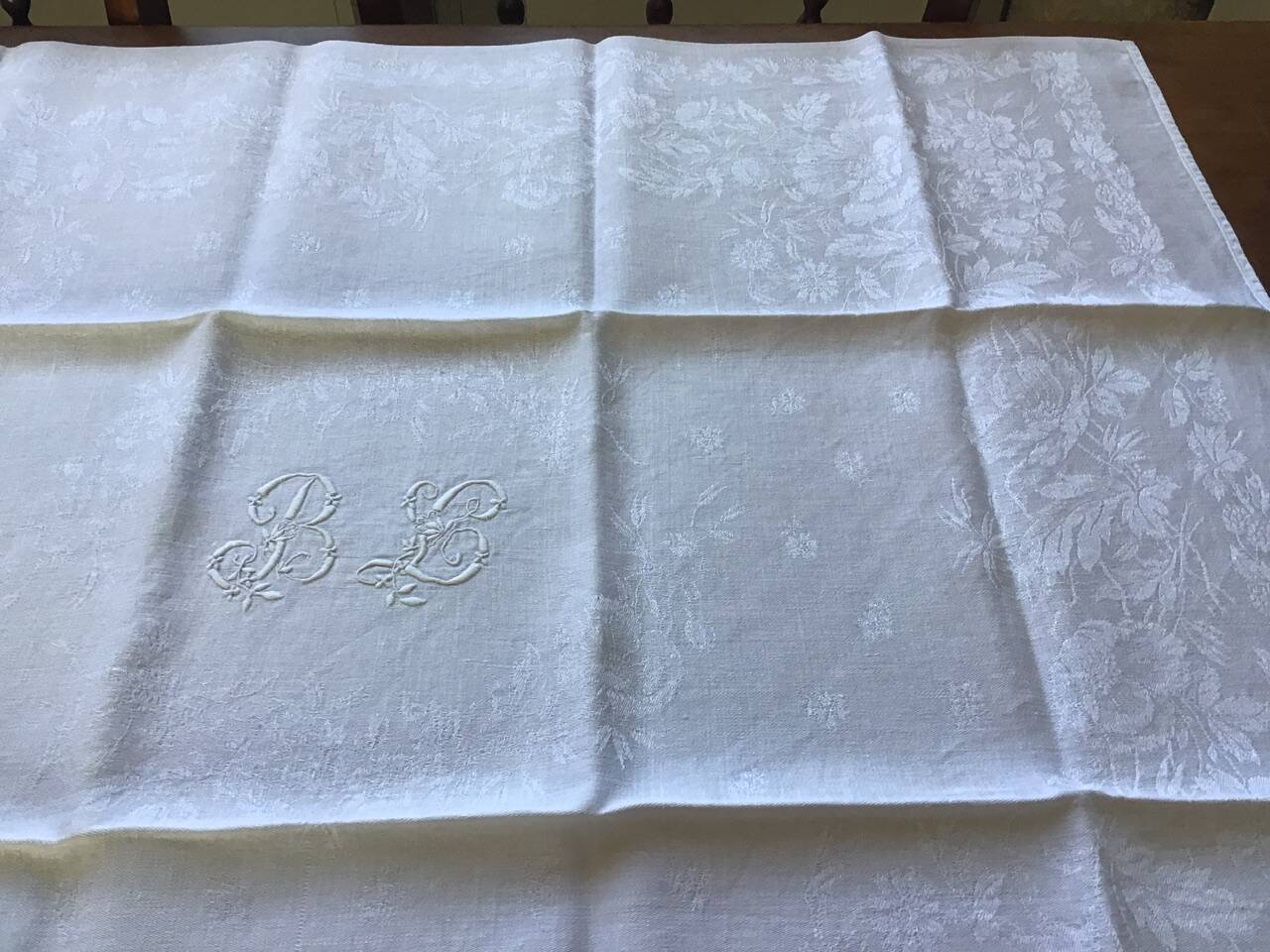Set of 12 19th century white napkins marked “BL”
