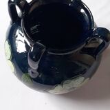 Antique Art Nouveau vase with a floral decoration.