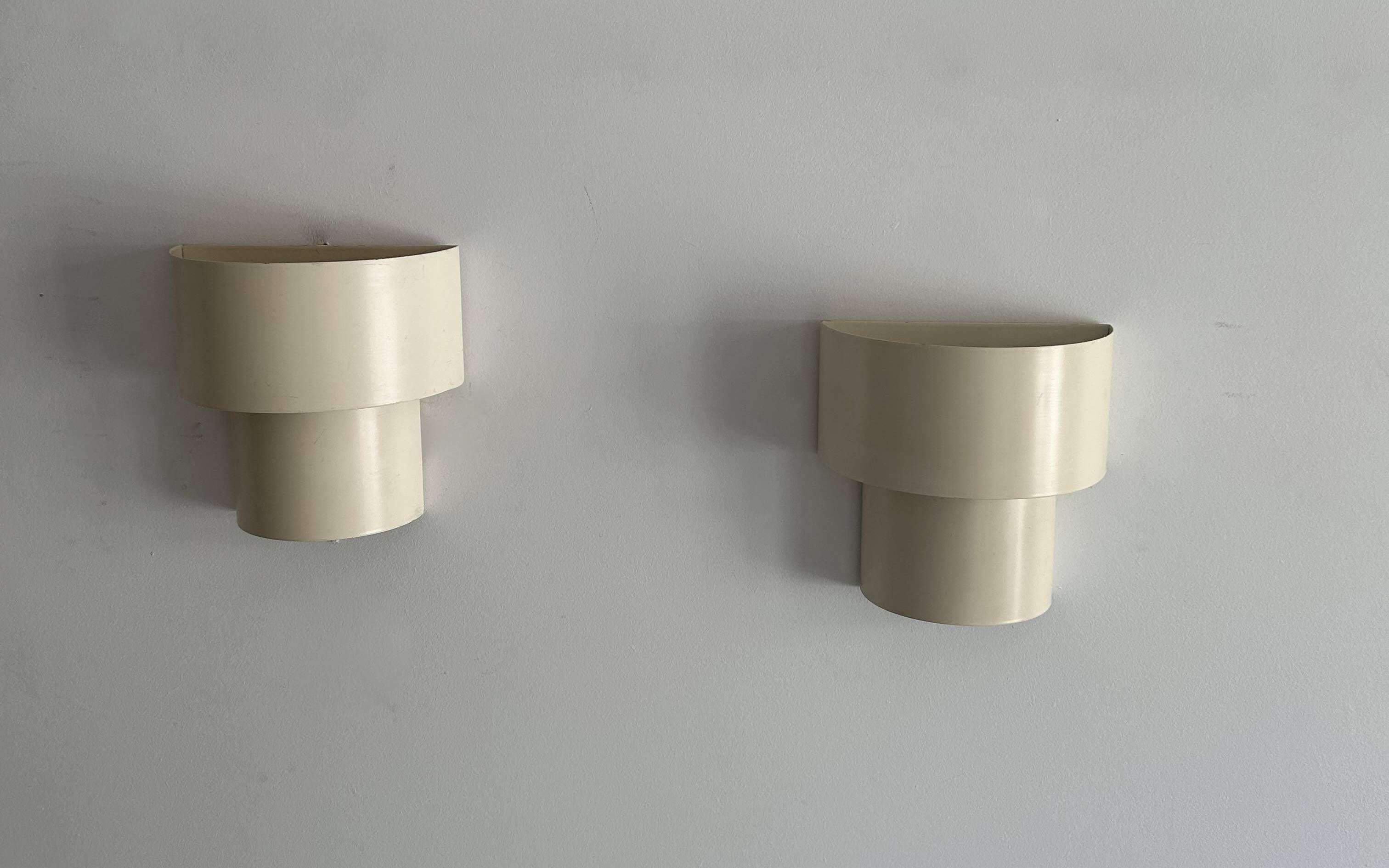 Pair of vintage modernist wall lights, white lacquered metal, Sweden 1970