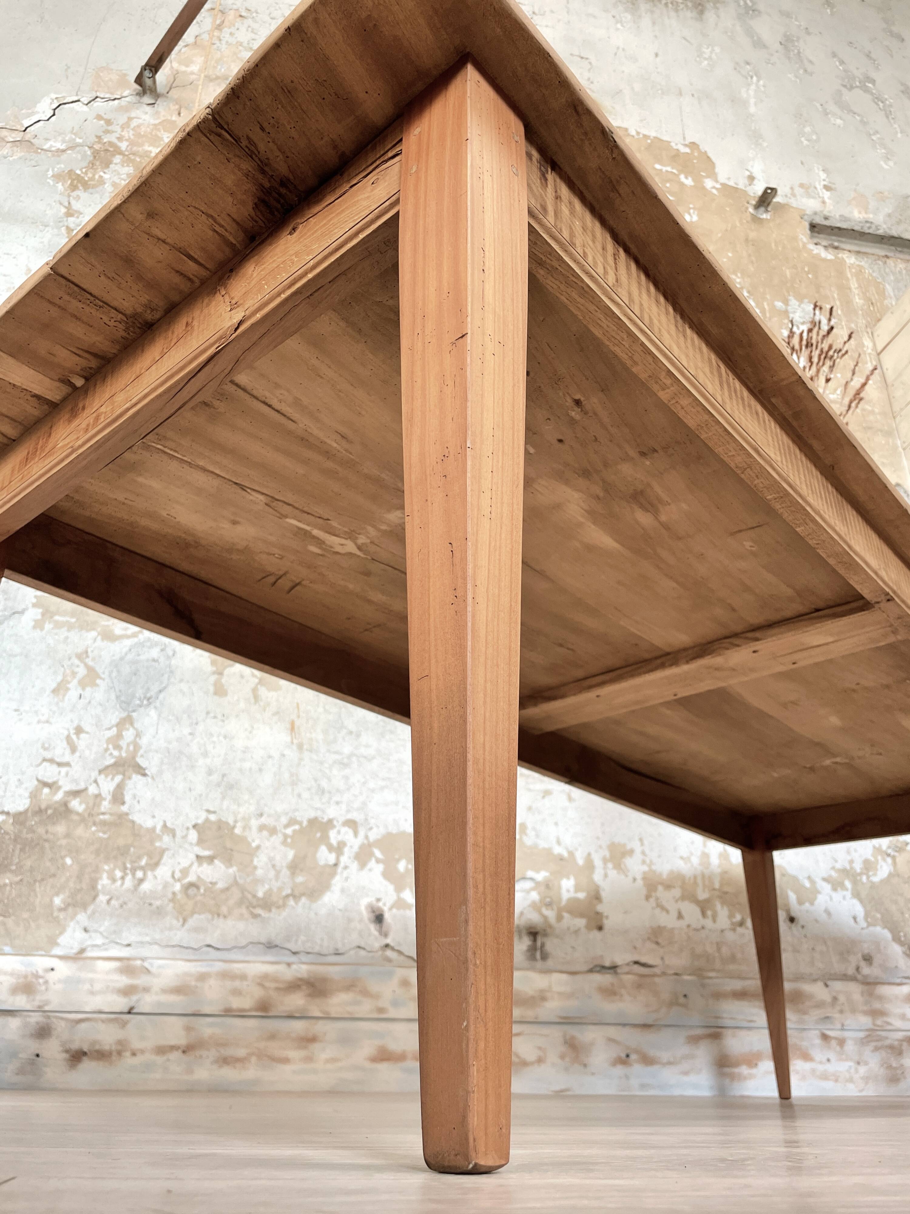 Vintage farm table with spindle legs.