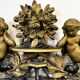 Antique 1800s black and gold mirror with cupid, France 1800s.