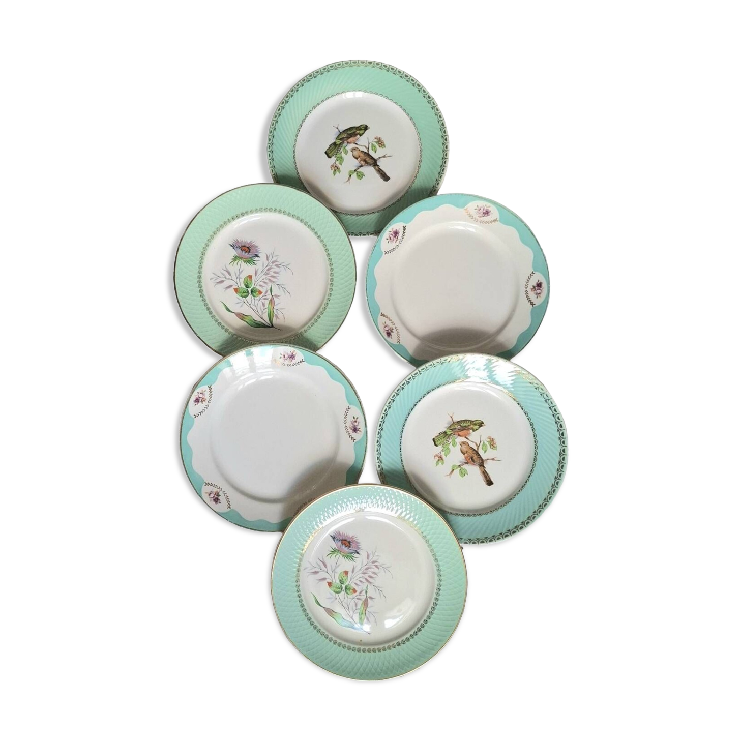 Old mismatched earthenware dinner plates