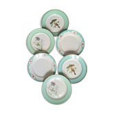 Old mismatched earthenware dinner plates