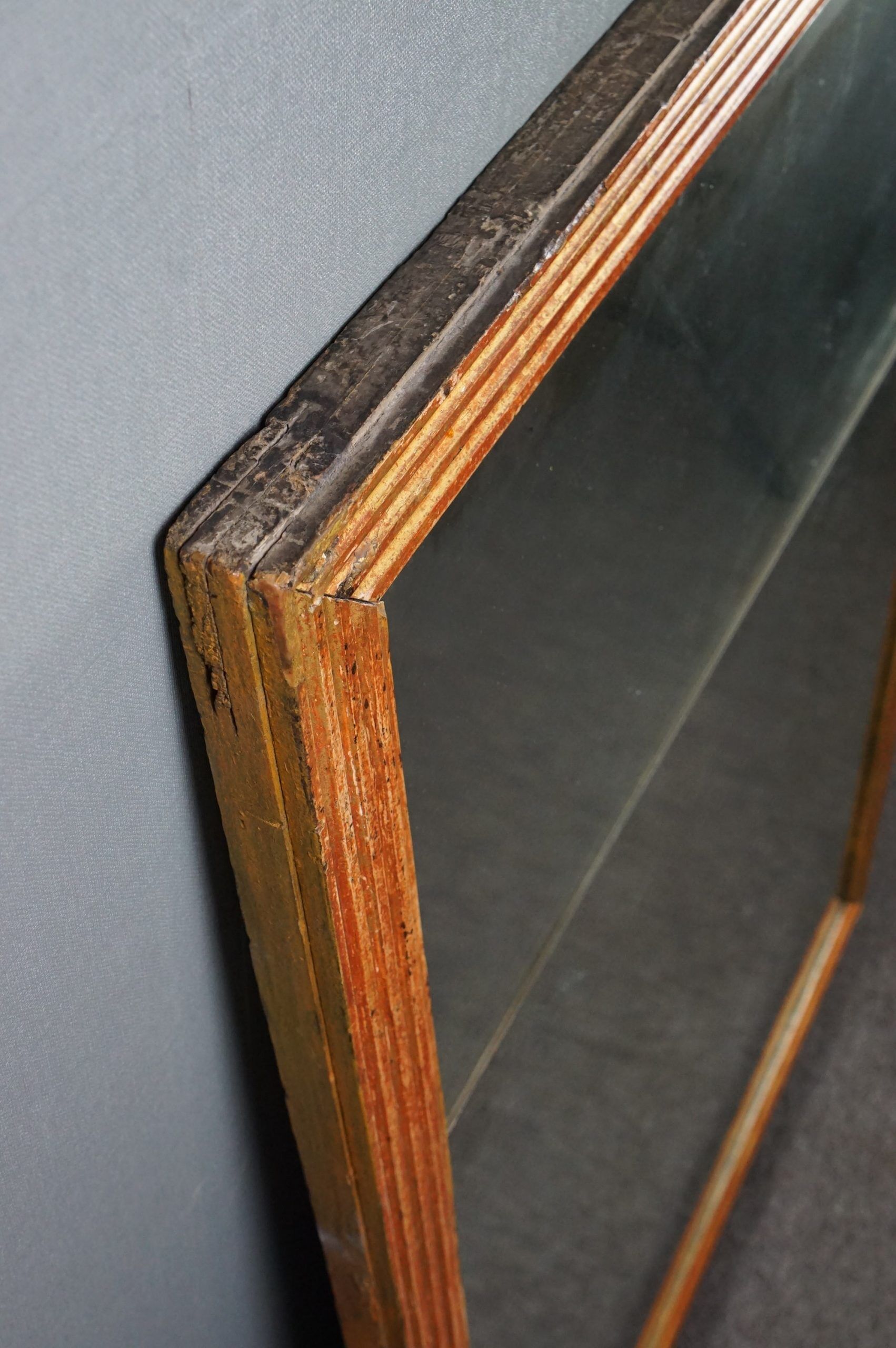 Patinated golden fireplace mirror eighteenth century 123 x 91.5 cm