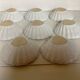 Eight white scallop shell bowls