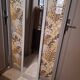 Rectangular mirror in light grey painted wood and beveled glass