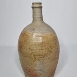 Set of three enamelled terracotta bottles
