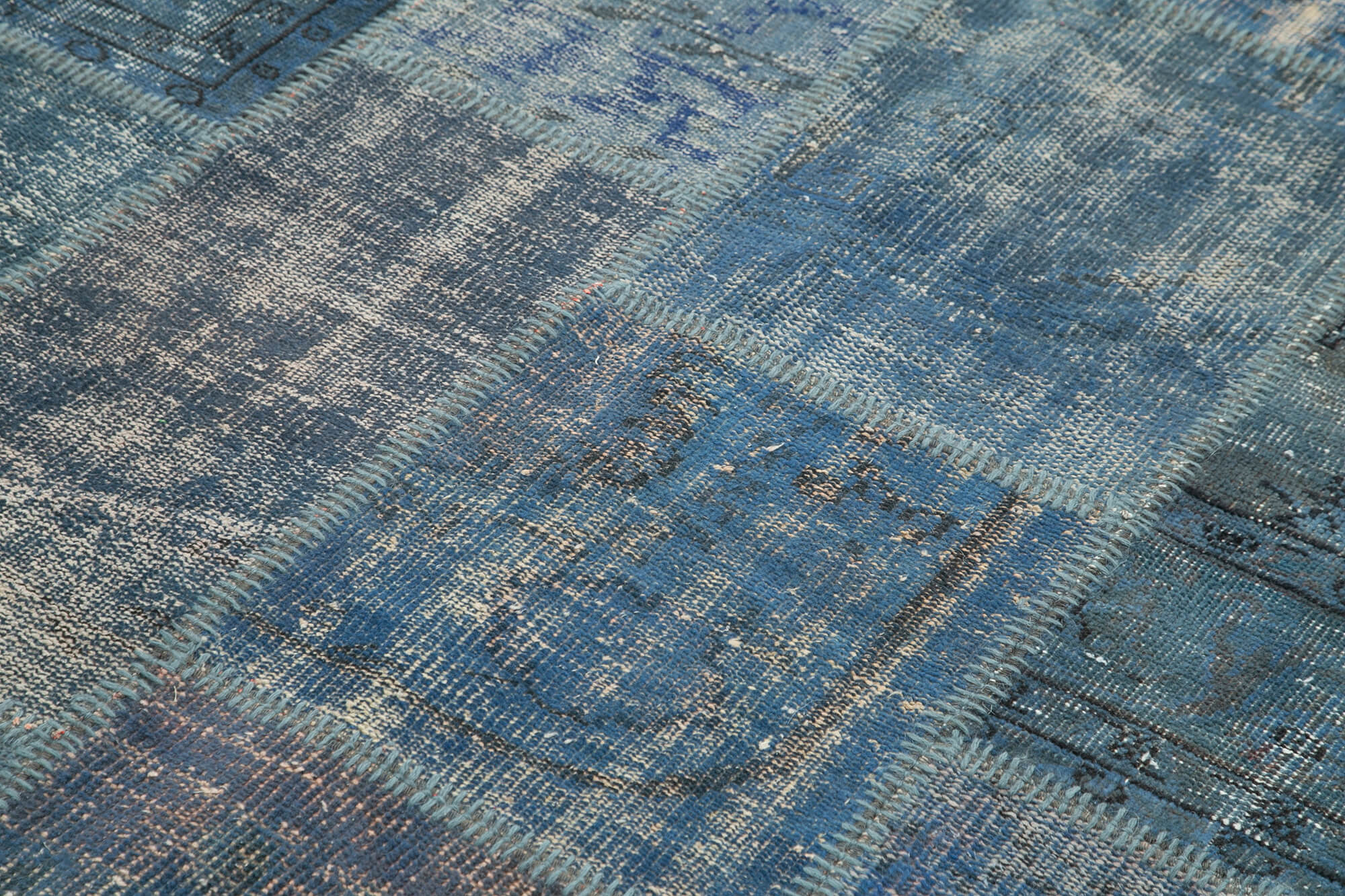 Handmade anatolian overdyed 176 cm x 243 cm blue patchwork carpet