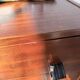 Commode teck poignées cuir 1960