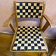Paire de chaises des années 50 en chêne dorées.