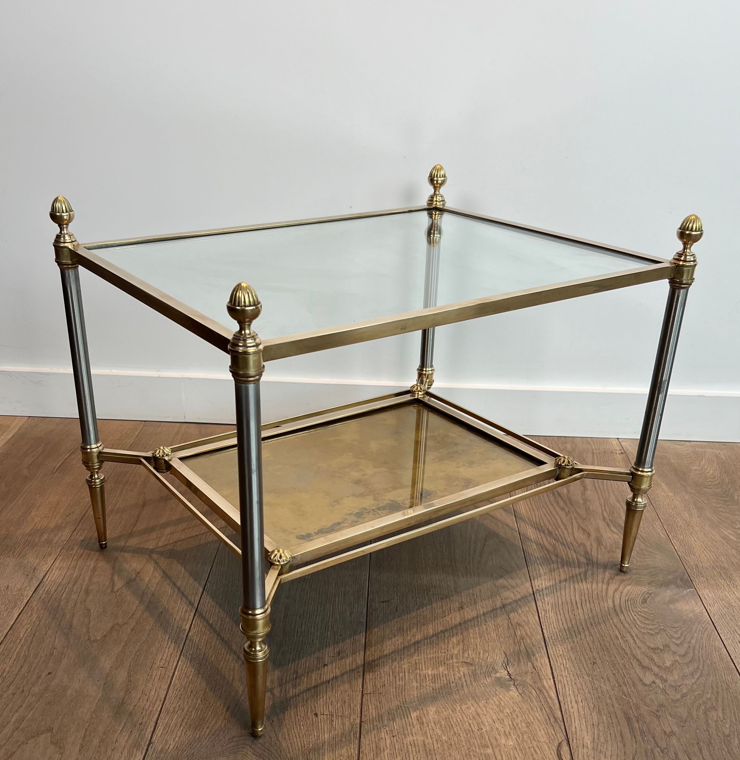 Pair of neoclassical side tables in steel and brass by Maison Jansen.