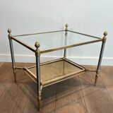 Pair of neoclassical side tables in steel and brass by Maison Jansen.